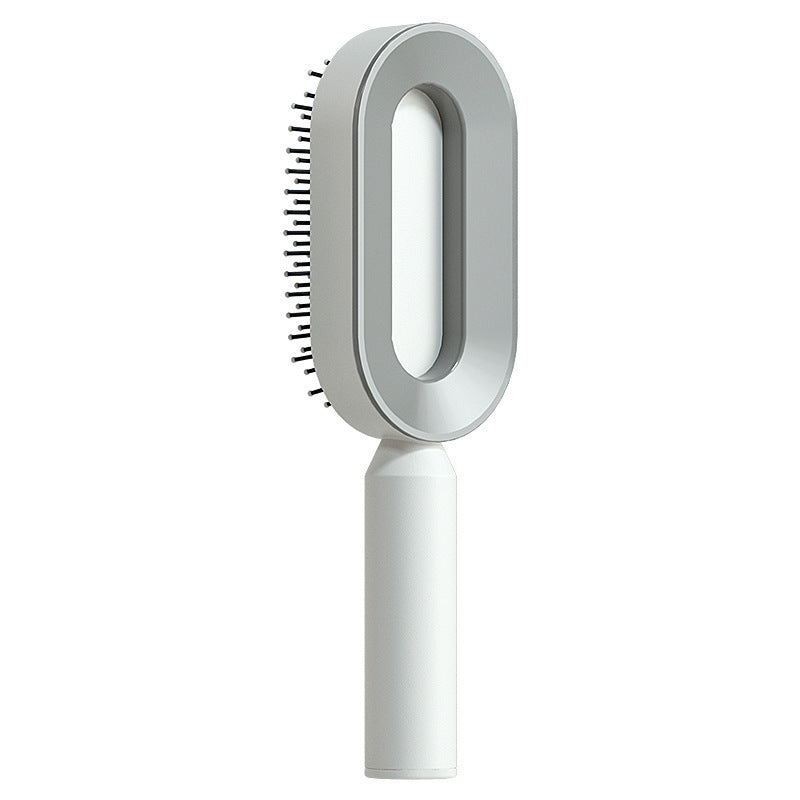 Brosse à cheveux autonettoyante