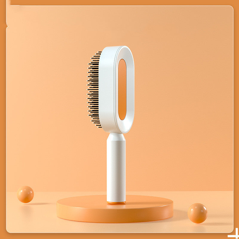 Brosse à cheveux autonettoyante